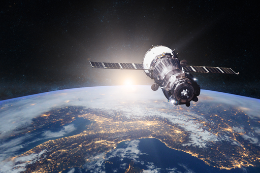 Communication satellite and aerial view of earth